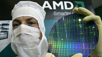 AMD-Technician-Poses-With-Chip-Wafer